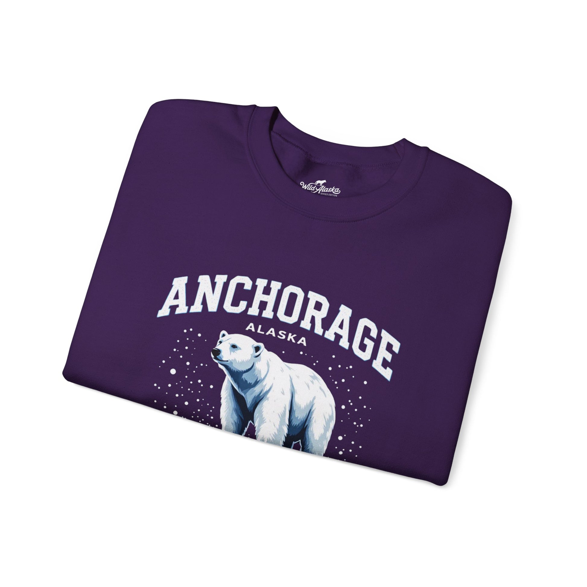 Folded gray t-shirt with a white paw print design on a white background