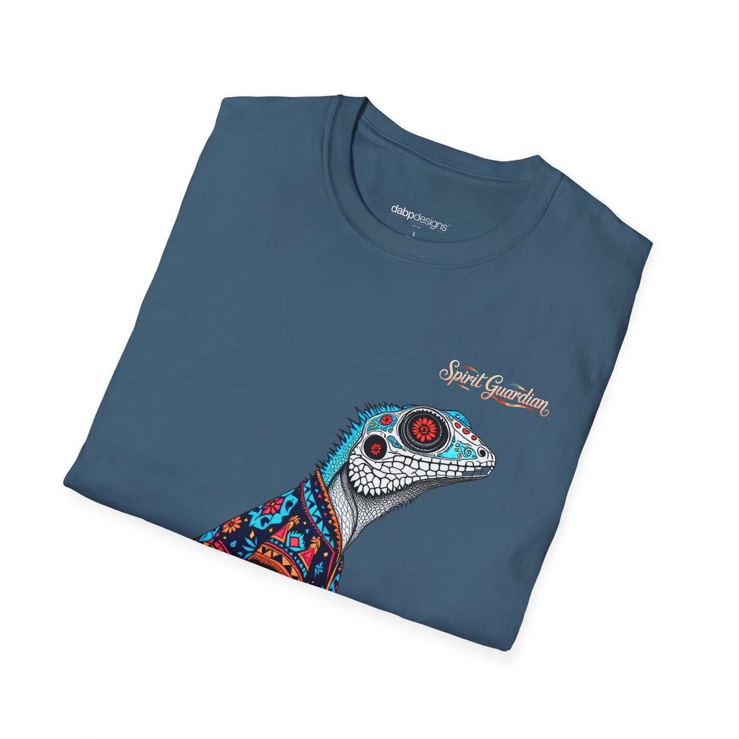 Folded blue t-shirt with a colorful lizard design and 'Spirit Guardian' text on a white background