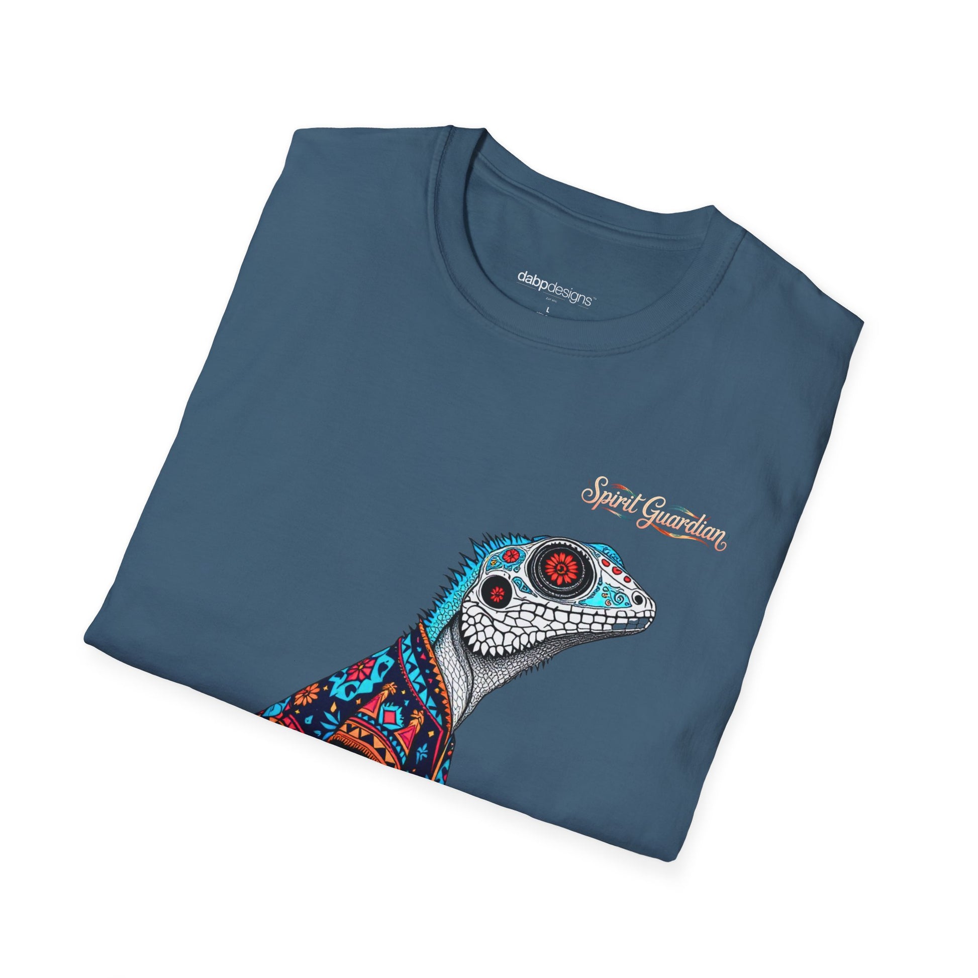 Folded blue t-shirt with a colorful lizard design and 'Spirit Guardian' text on a white background