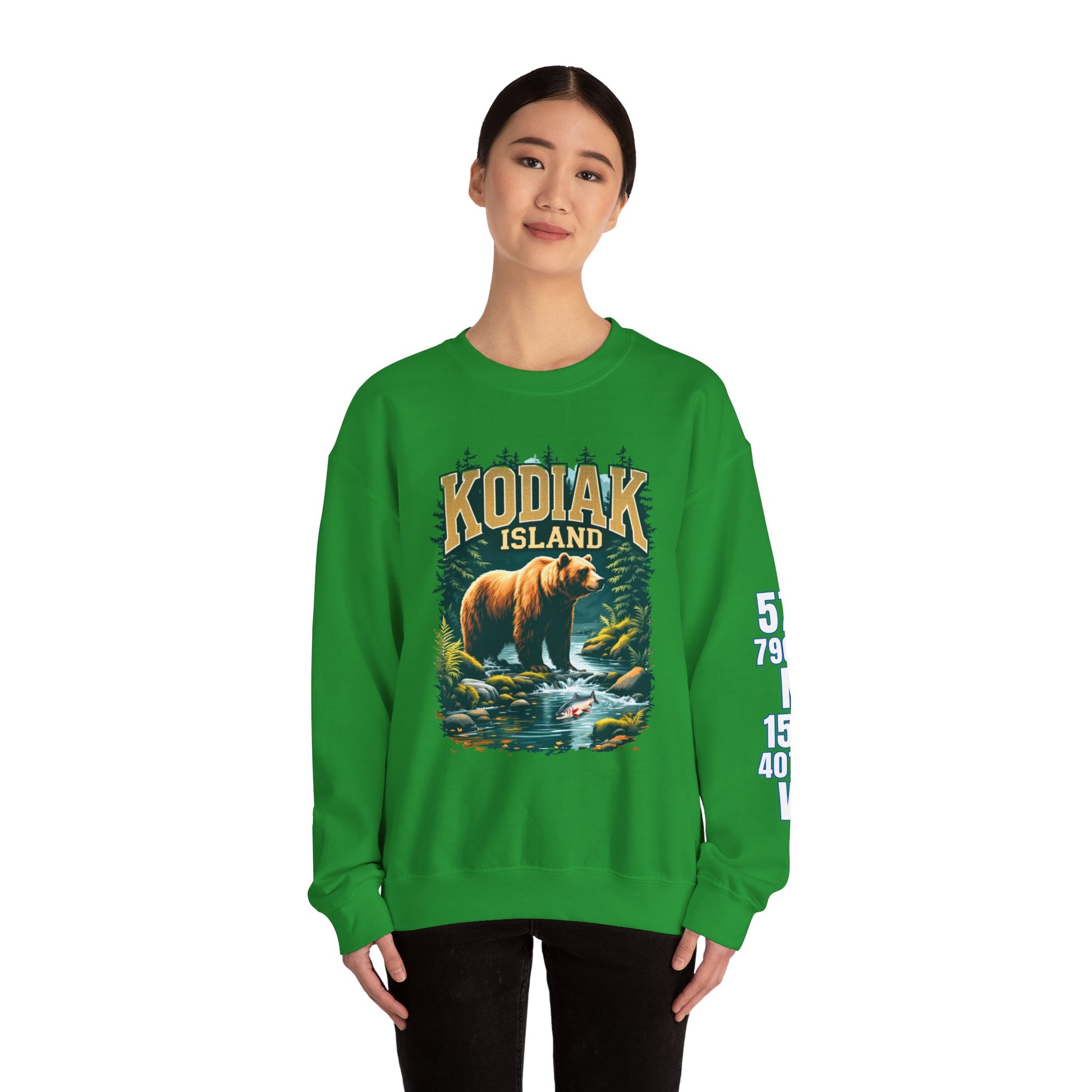 Person wearing a green sweatshirt with a bear graphic and 'Kodiak Island' text on a white background