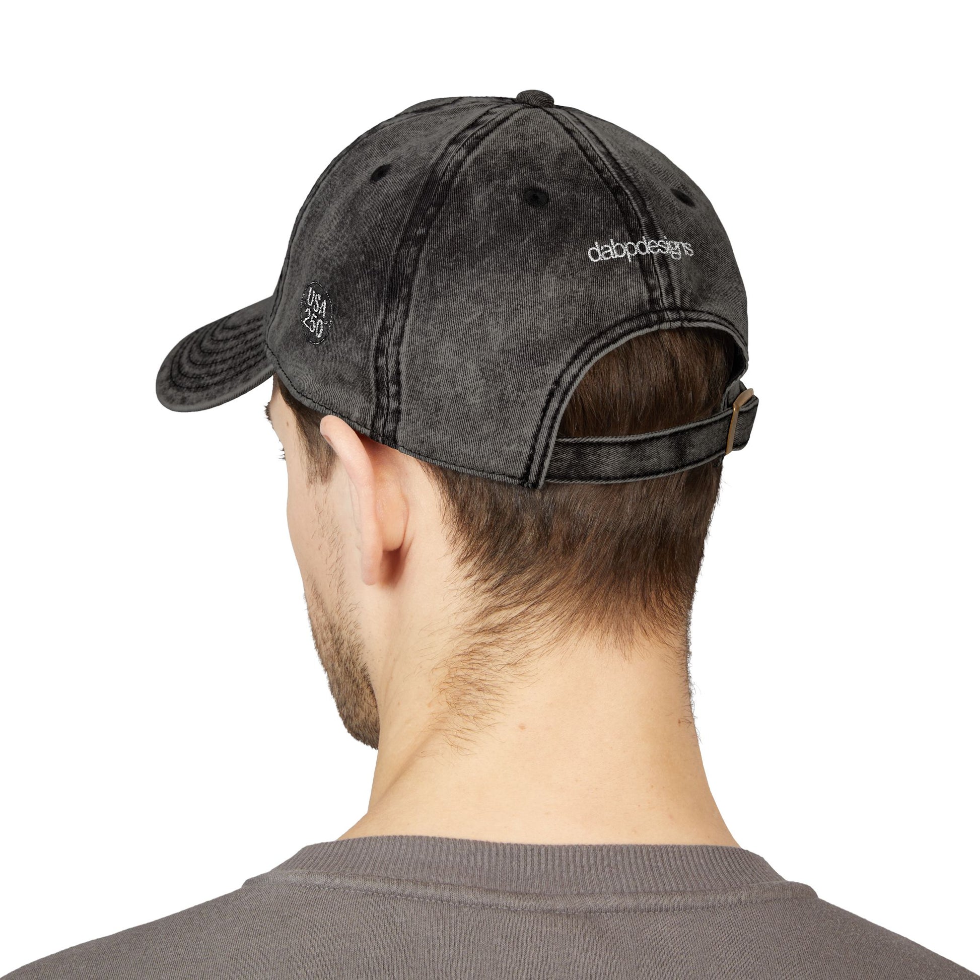 Person wearing a black cap on a white background