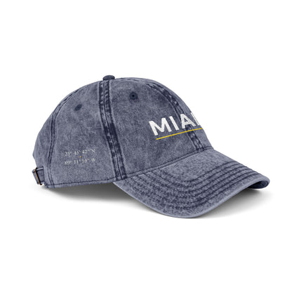 Gray distressed baseball cap with text on a white background