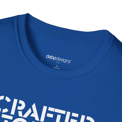 Close-up of a blue t-shirt with 'dabbdessns' branding and partially visible text.