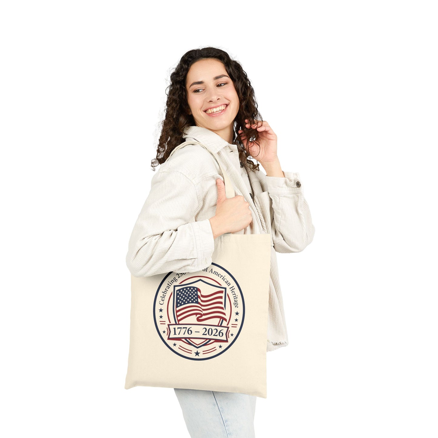 Woman holding a tote bag with a fish design on a white background