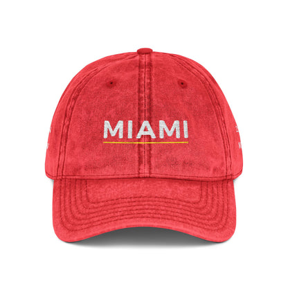 Red cap with 'New Identity' text on a white background