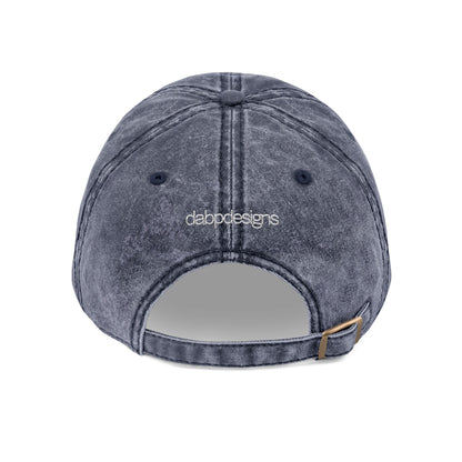 Blue denim cap with 'WYOMING' embroidered on the back against a white background