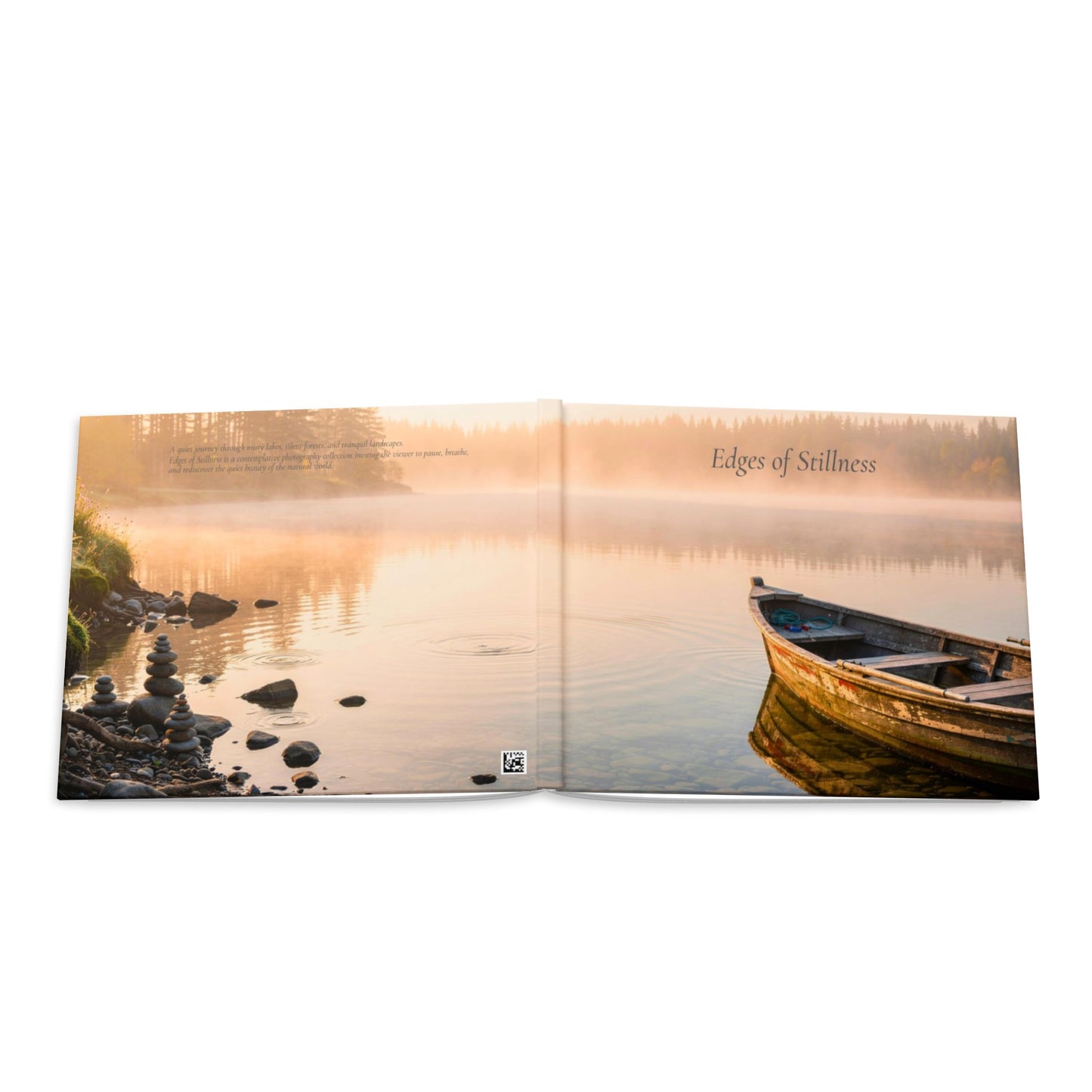 Open book showing a serene lake scene with a boat and sunset.