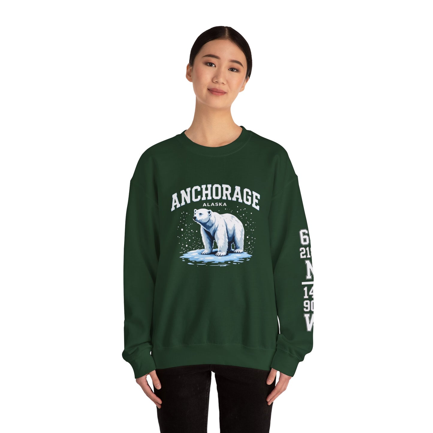 Person wearing a green sweatshirt with a polar bear graphic and 'Anchorage' text on a white background