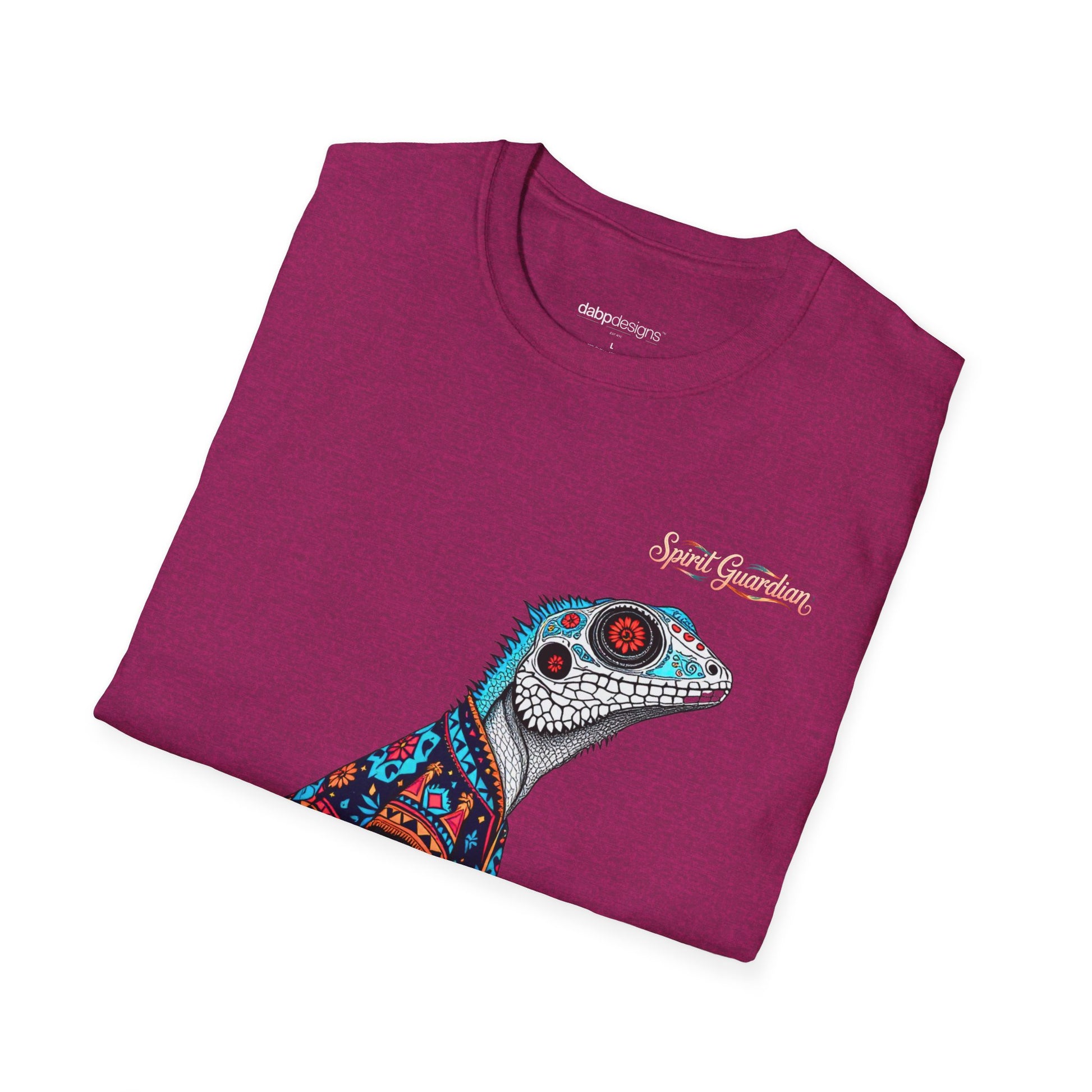 Folded purple t-shirt with a colorful lizard design and 'Spirit Guardian' text on a white background