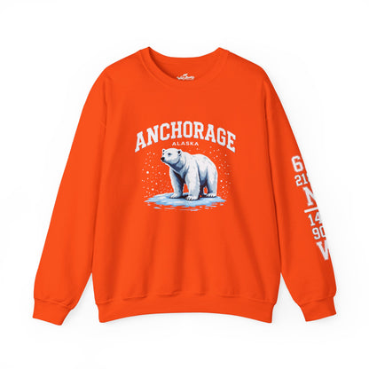 Orange sweatshirt with a polar bear graphic and 'Anchorage, Alaska' text on a white background