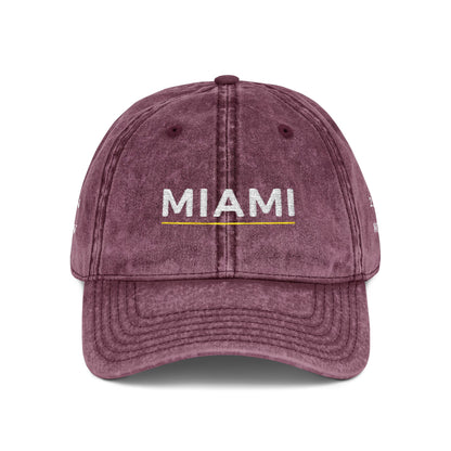 Maroon cap with 'LEVANDE' and 'EST. 2010' text on a white background