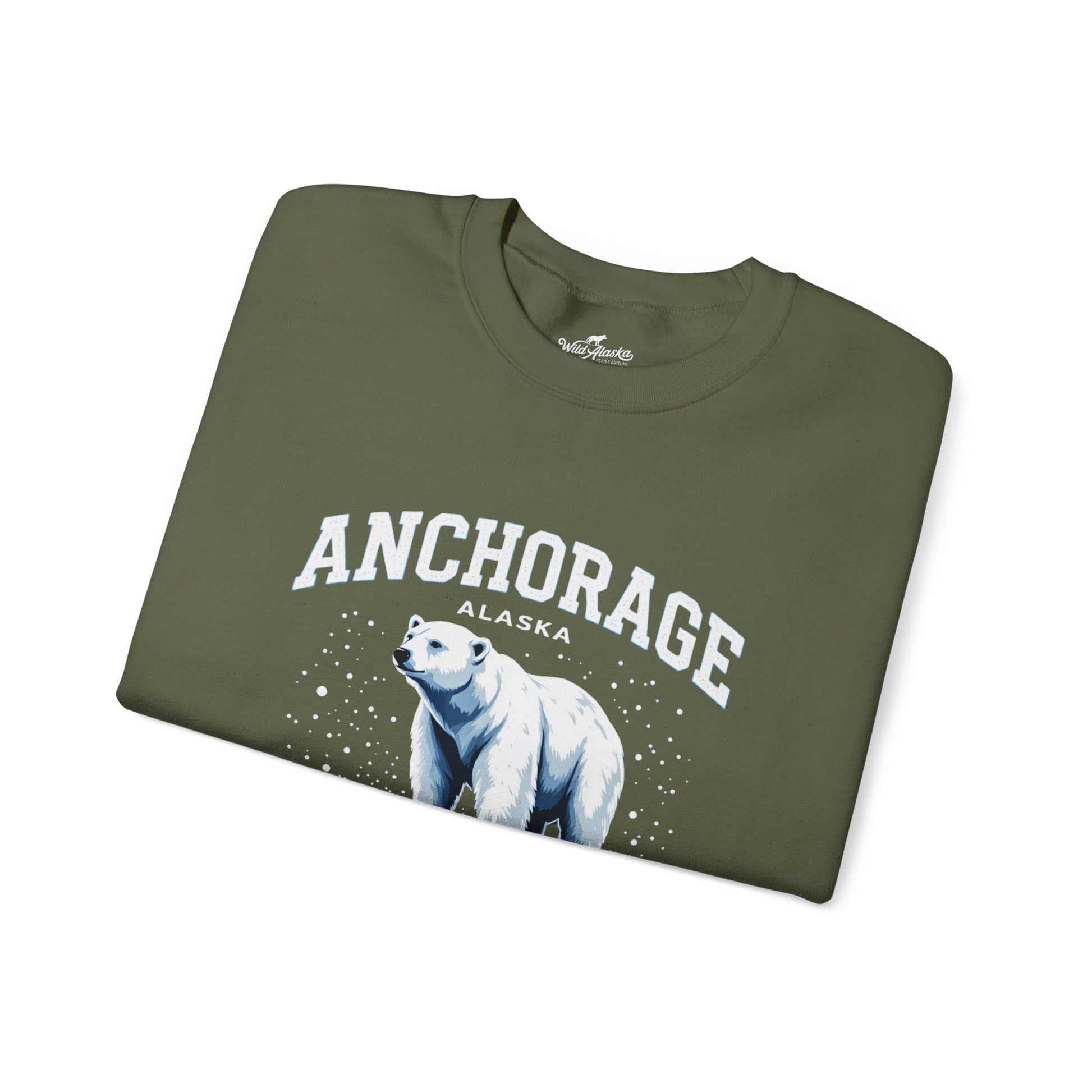 Folded maroon sweatshirt with 'Anchorage Alaska' and polar bear design on a white background