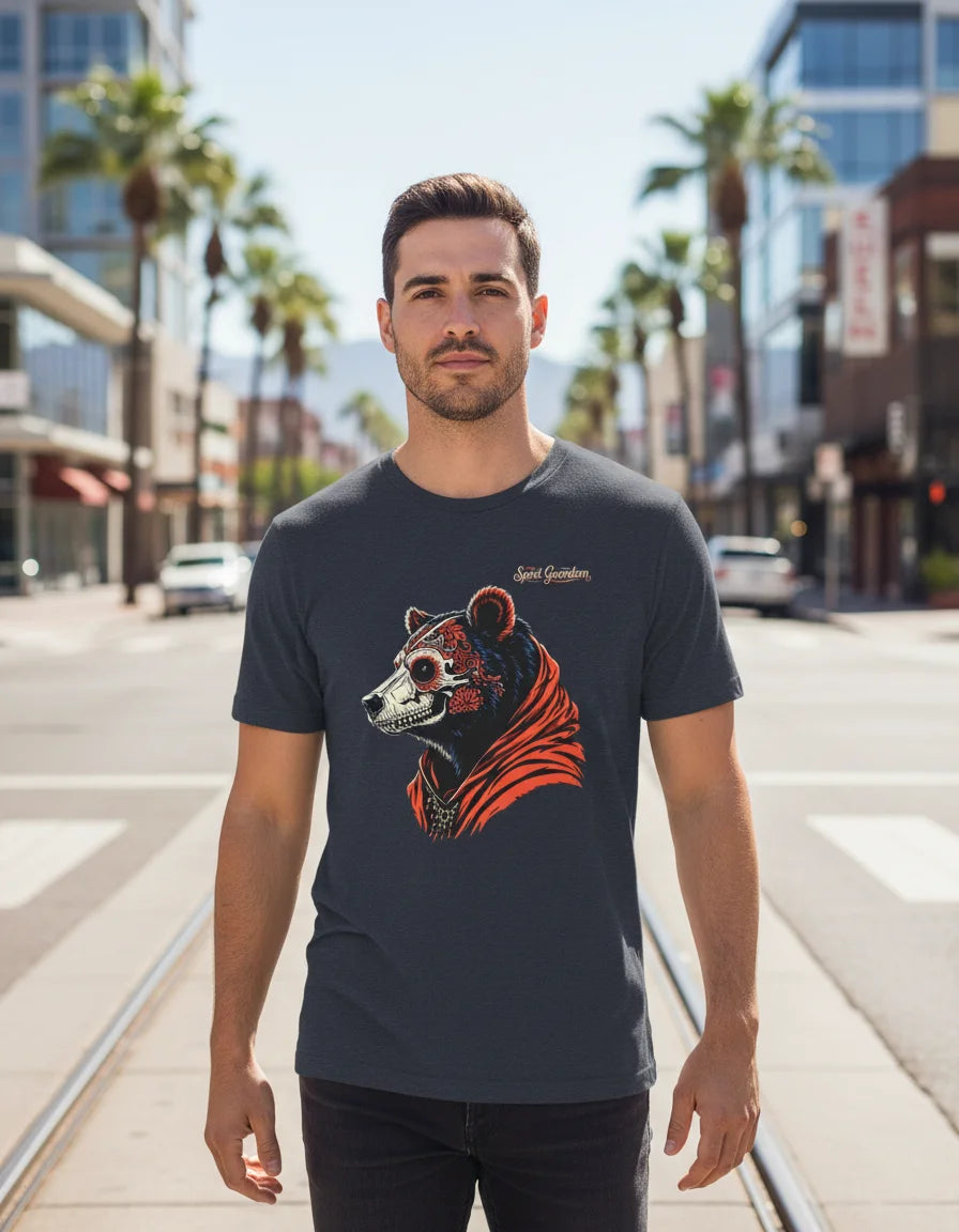 Man wearing a black t-shirt with a colorful bear graphic on a city street.