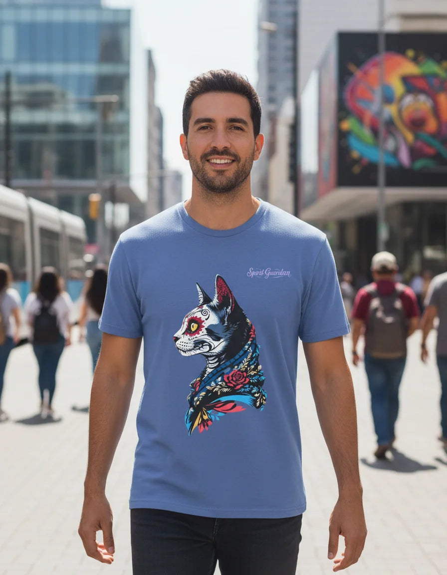 Man wearing a blue t-shirt with a colorful dog design in an urban setting