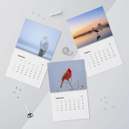 Four calendar pages showing different scenes on a light gray background