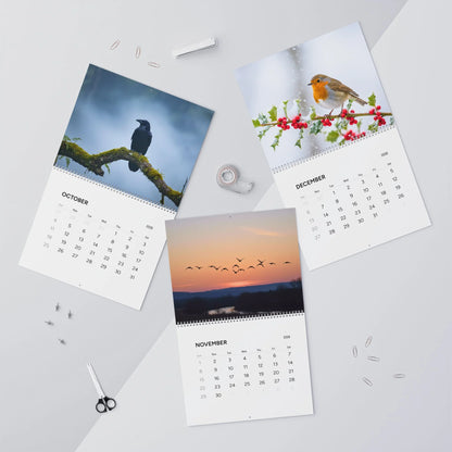 Three calendar pages showing different scenic images on a light gray background.