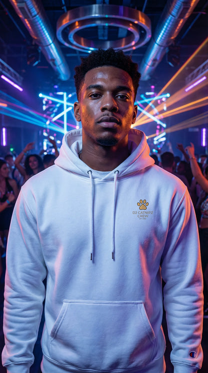 Person wearing a white hoodie with a logo in a neon-lit indoor setting