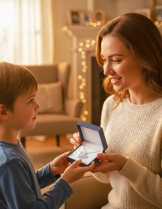 Woman showing a small box to a child in a cozy living room.