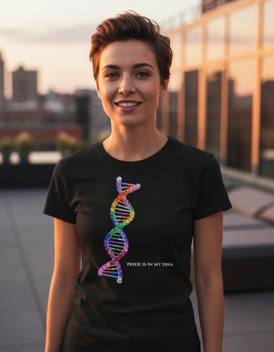 Person wearing a black t-shirt with a colorful DNA strand design and 'Pride is in my DNA' text on a rooftop.