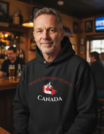 Man wearing a black hoodie with 'Prince Edward Island, Canada' design in a bar setting